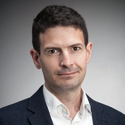 Professor Simon Mackenzie Portrait of a man looking at the camera