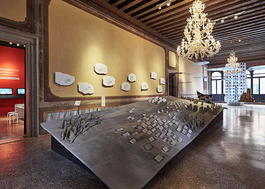 Architecture Lecturer Simon Twose's exhibit concrete/ cloud/. A huge piece of concrete with little slabs of concrete attached.