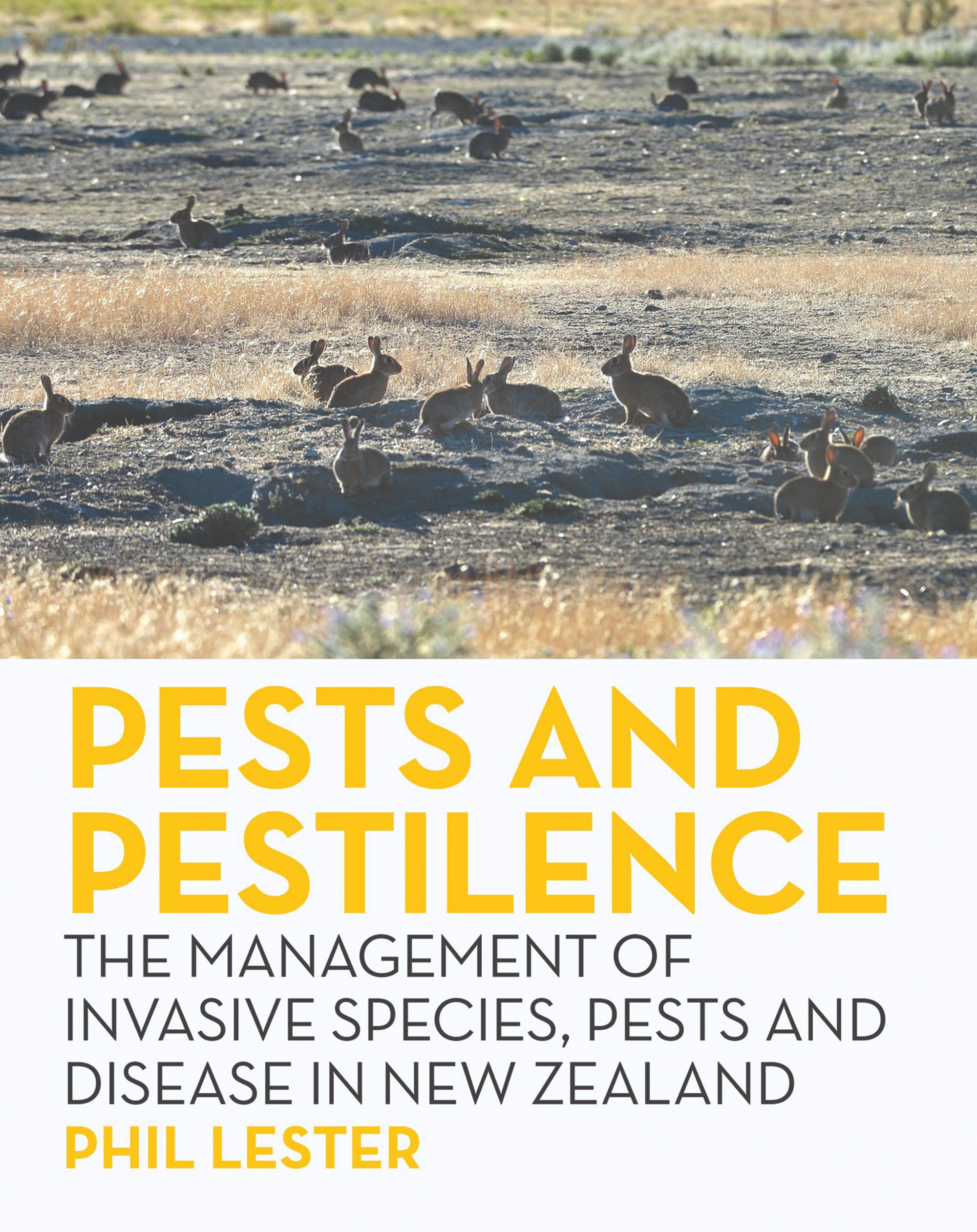 Book cover showing a photo by Stephen Jaquiery of rabbits on land they have degraded by browsing and making burrows.