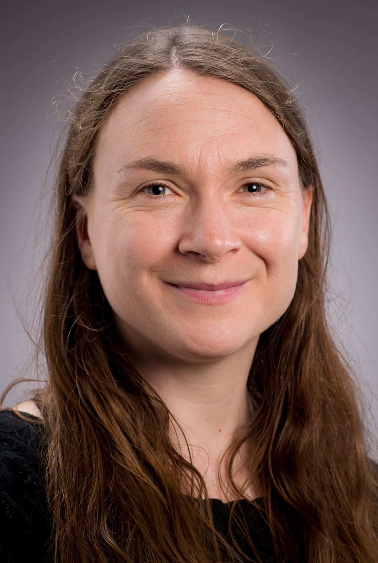 Miriam Ross smiles into the camera.