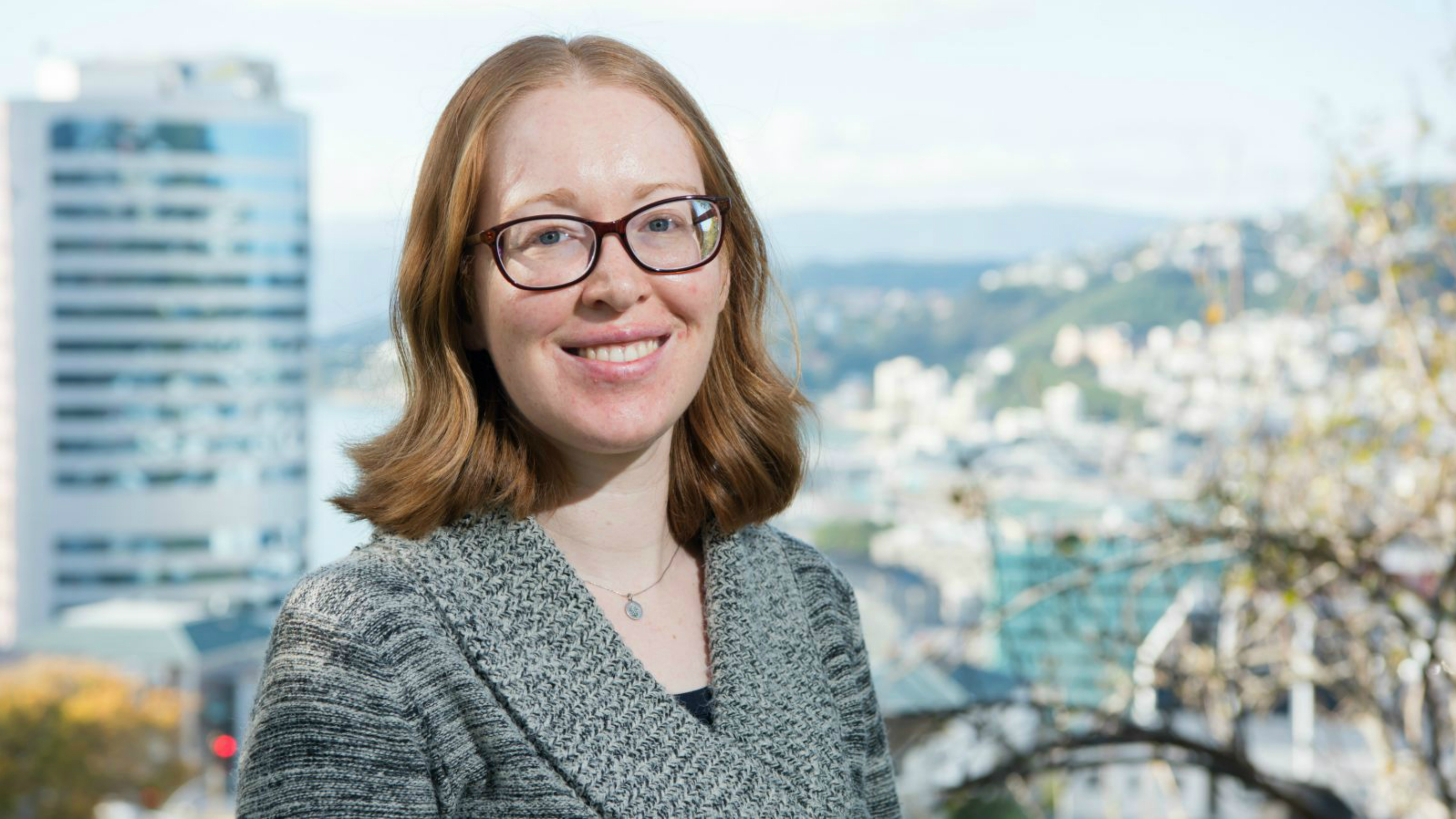Dr Hazel Godfrey with a view of Wellington in the background.