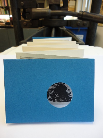 Concertina keepsake featuring a train on the cover.