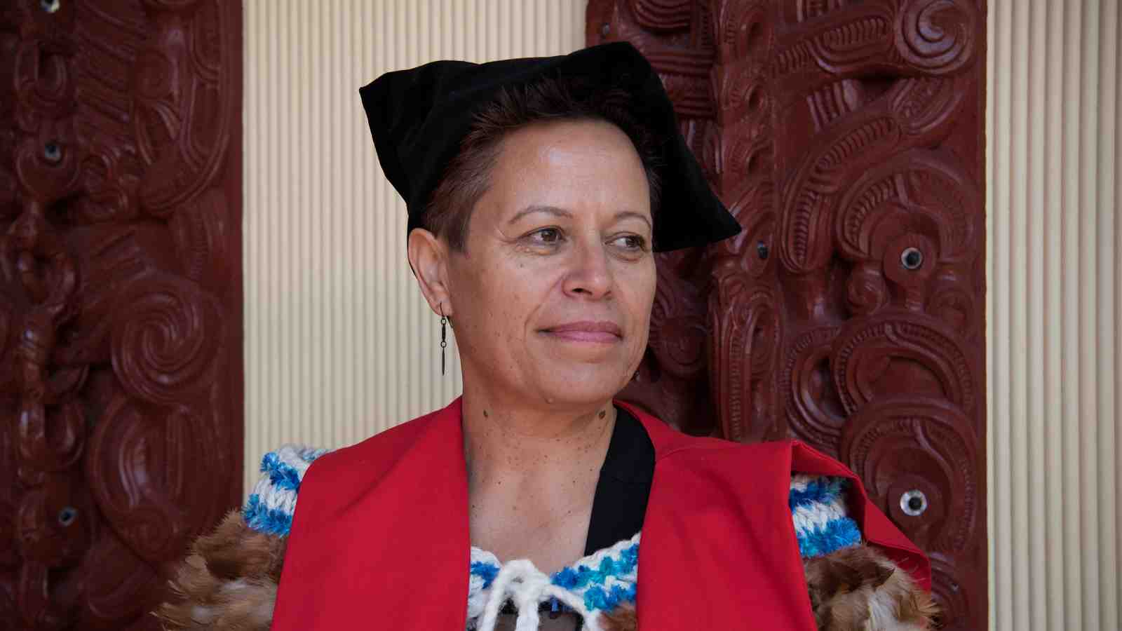Maureen Muller in her graduation gown and cap.