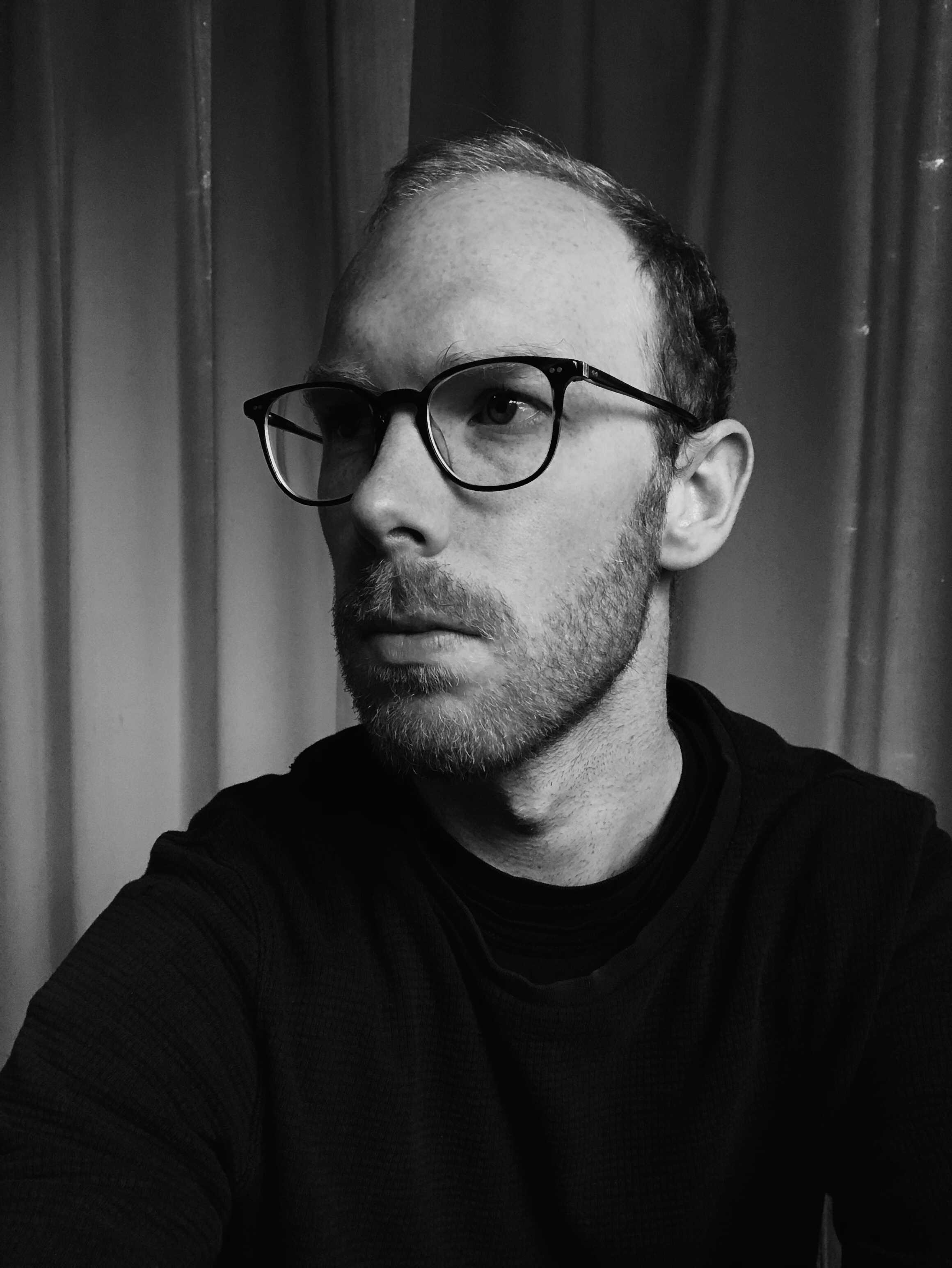 Black and white photo of Master of Architecture alumnus Thomas Seear-Budd.