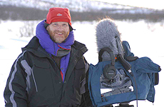 Simon Lamb with a camera