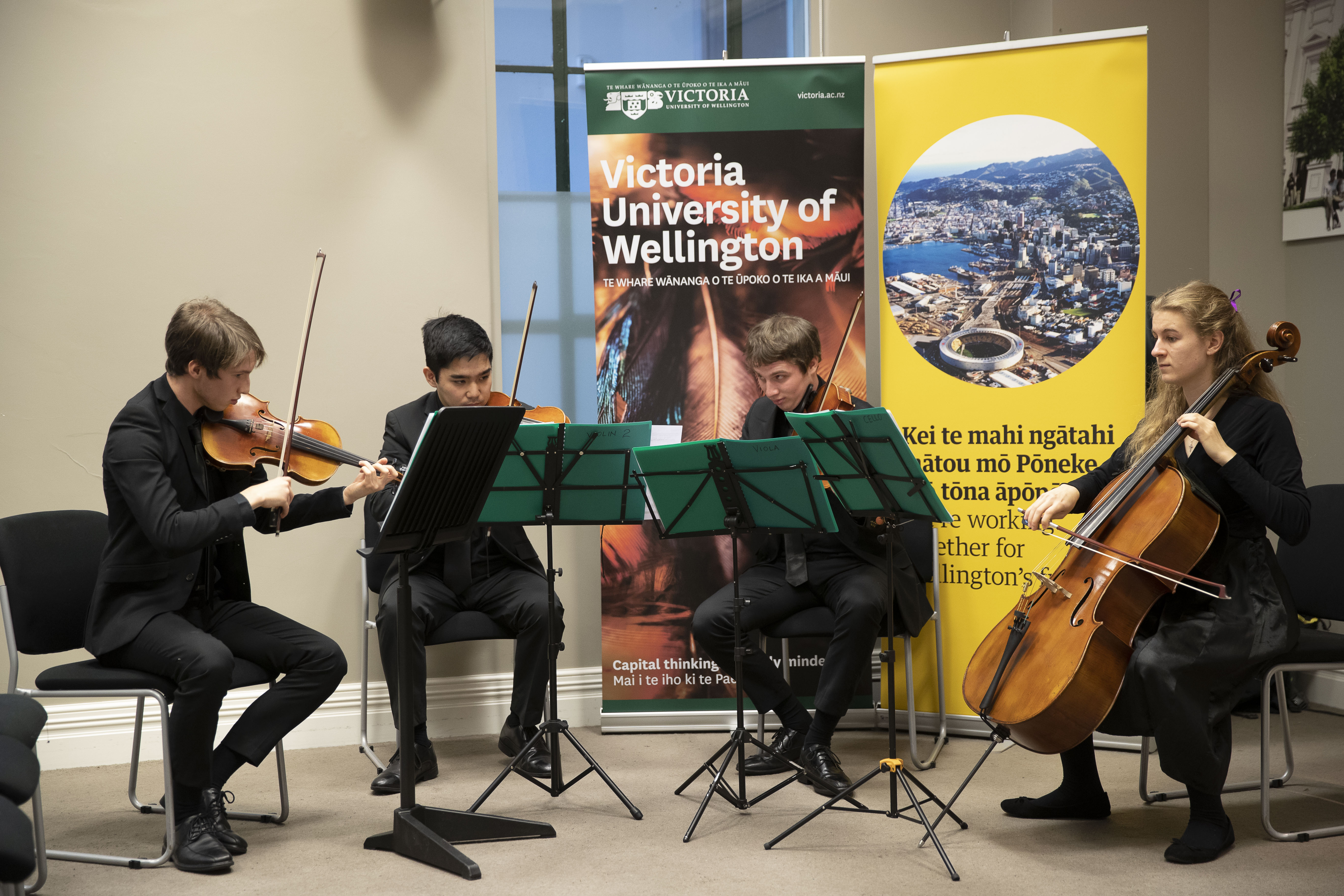 NZSM students play during the signing of the agreement.