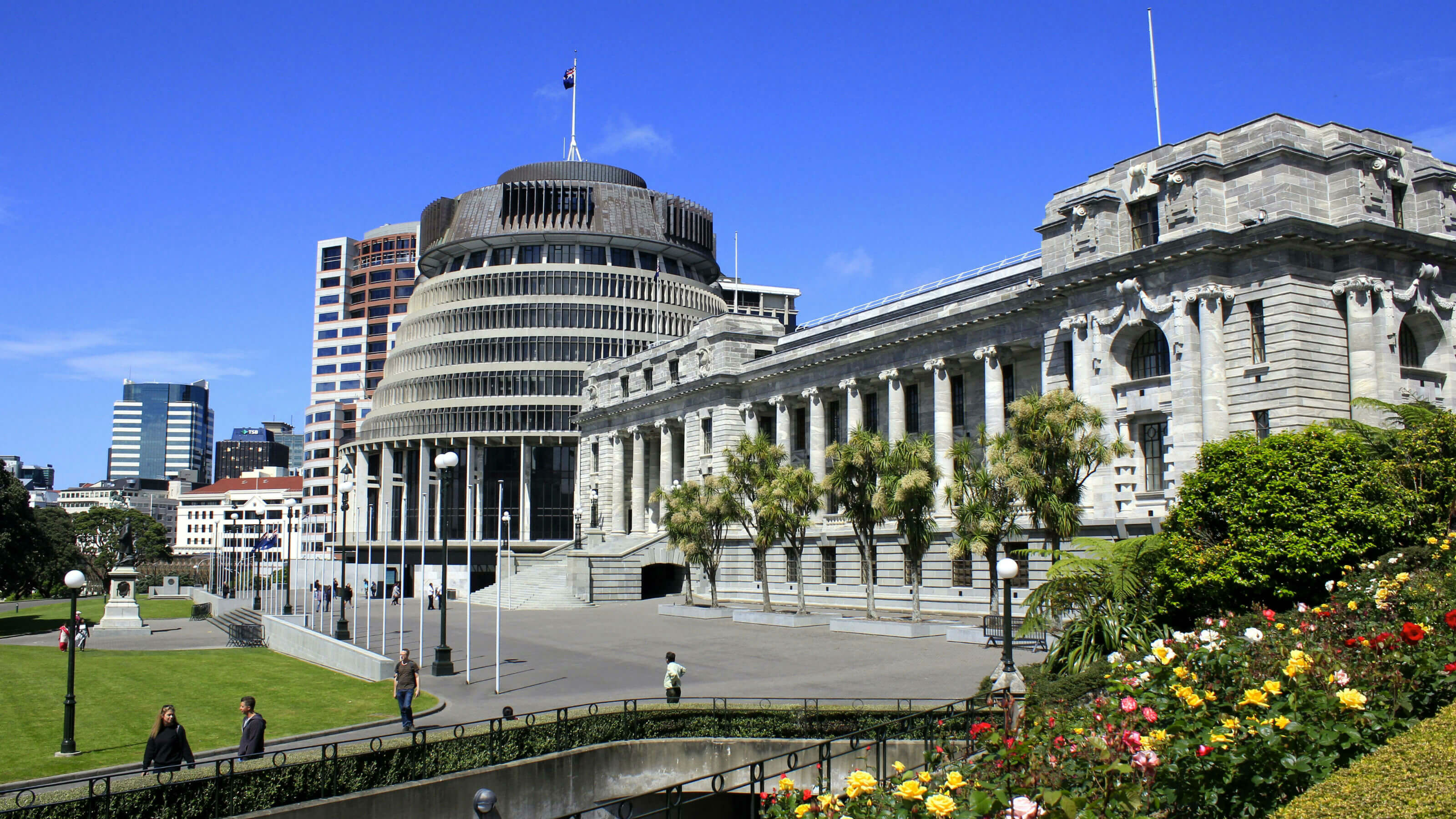 The front lawn of New Zealand Parliament including the Beehive and Parliament House.