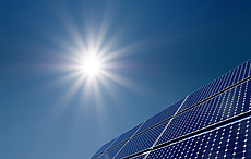 Sun shining on solar panels