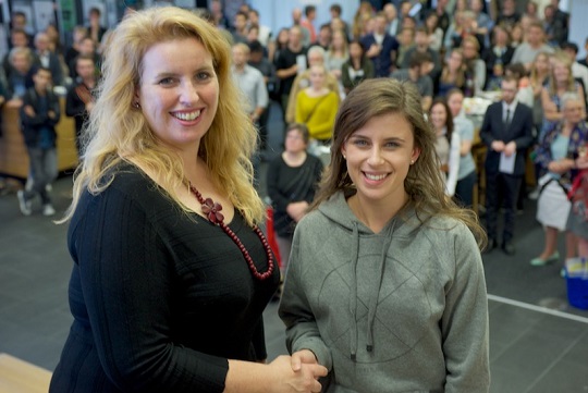 Professor Kate McGrath congratulating Lauren Chalmers