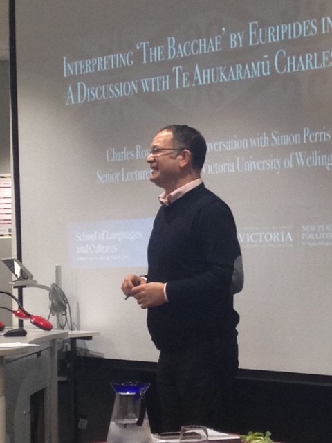 Charles Royal stands and addresses the audience at the NZCLT event.