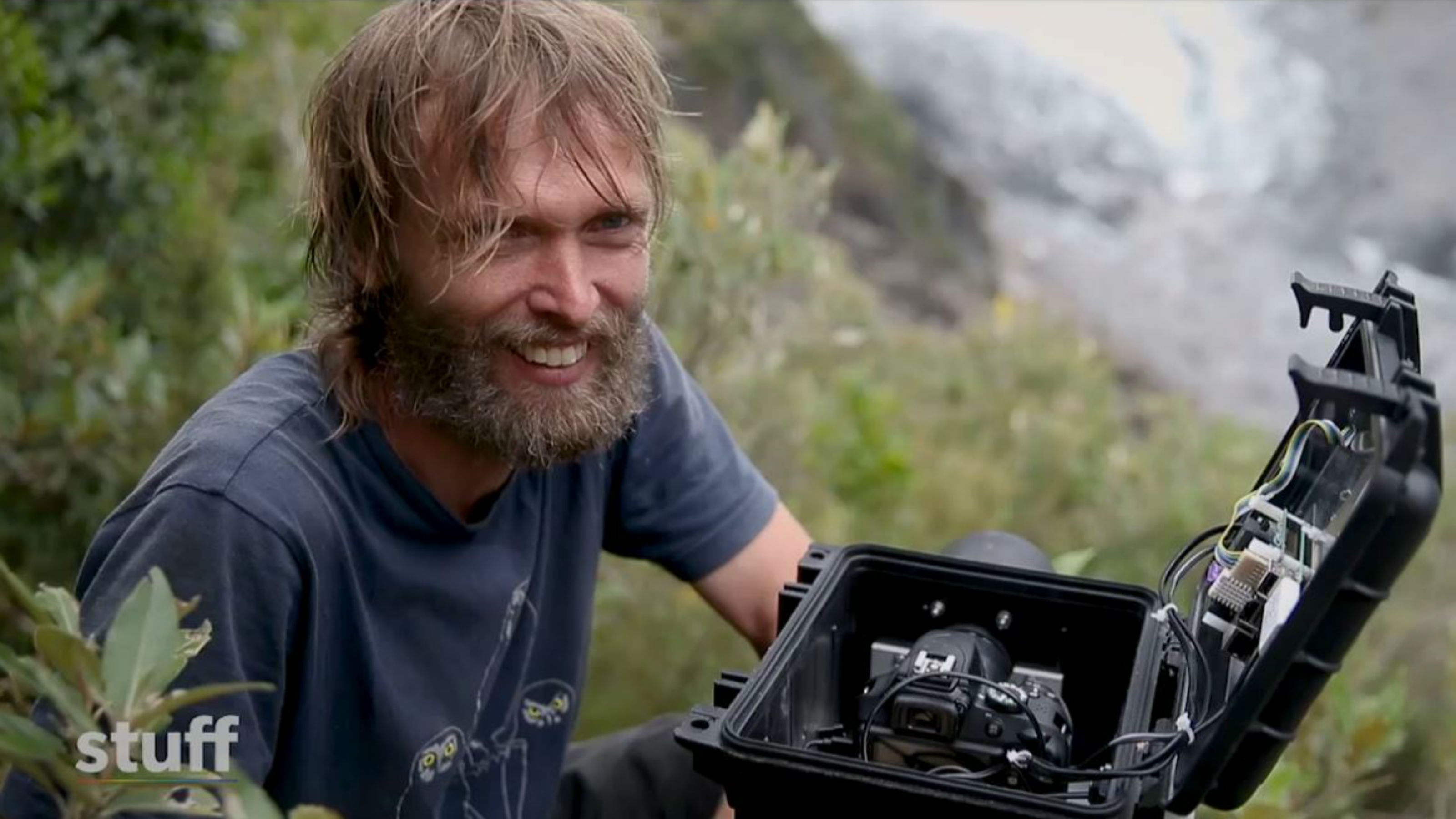 Anderson installs a camera looking towards the glacier.