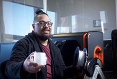 Lionel with a 3D printed cup made from recycled plastic. Lionel with a 3D printed cup made from recycled plastic.