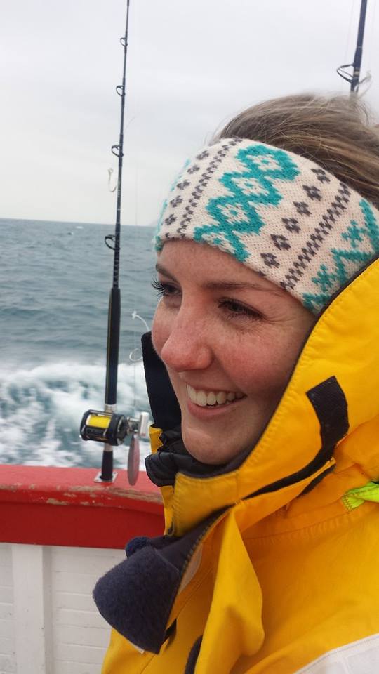 Head and shoulders photo of Laura McCartney on a boat with ocean in the background.