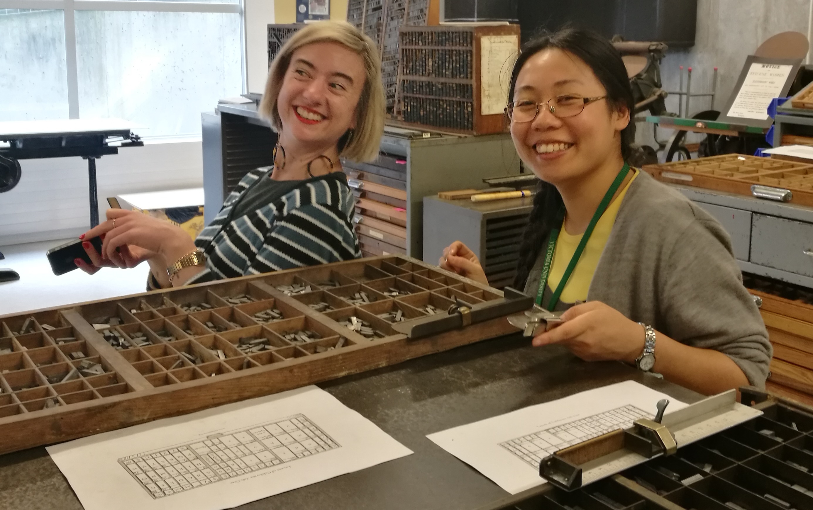 Charlotte Darling and Ya Wen Ho set type on National Poetry Day.