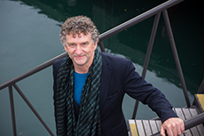 Professor Martin Bryant standing on the jumping platform at Wellington's waterfront.