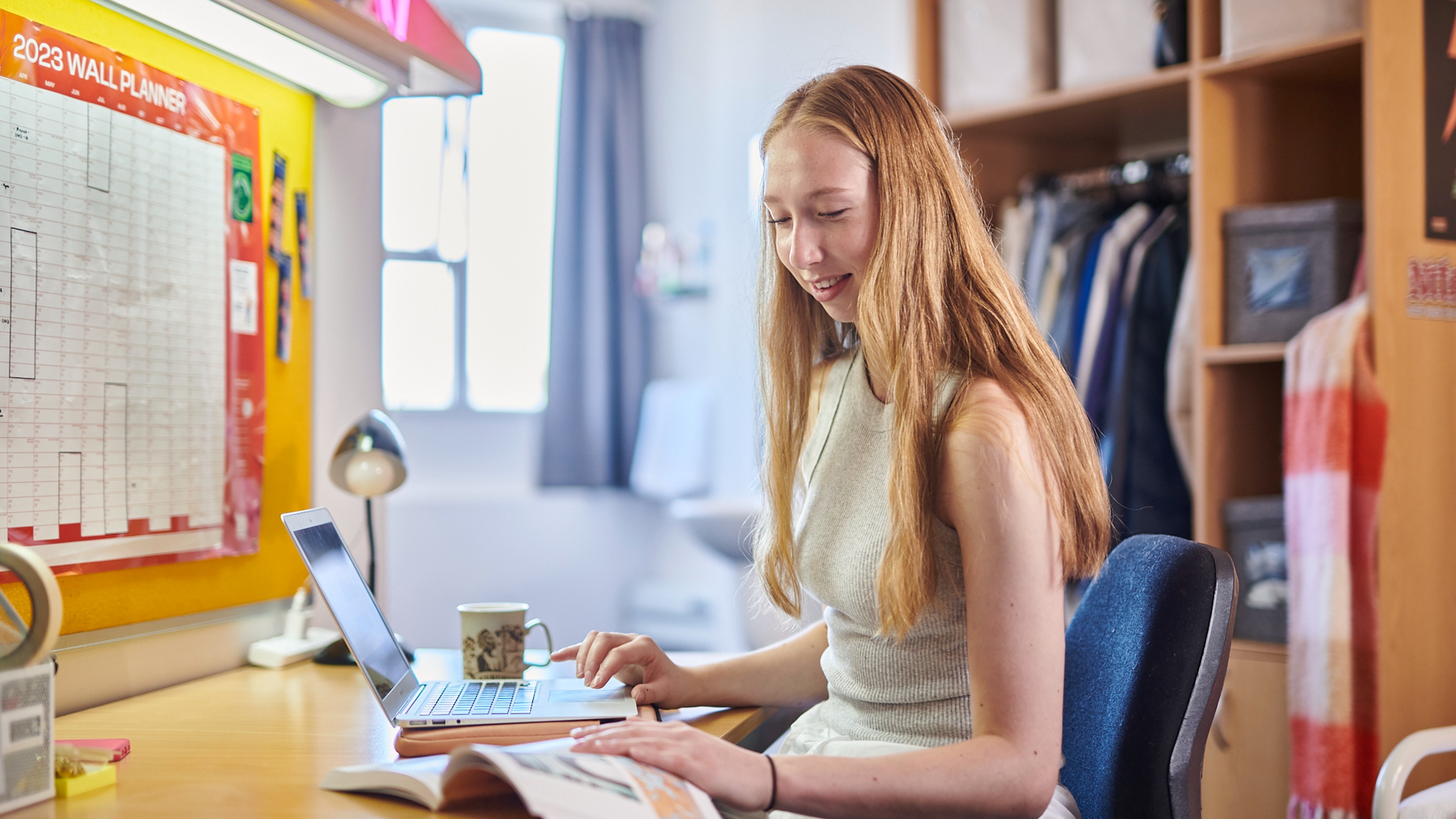 A resident studying in her room