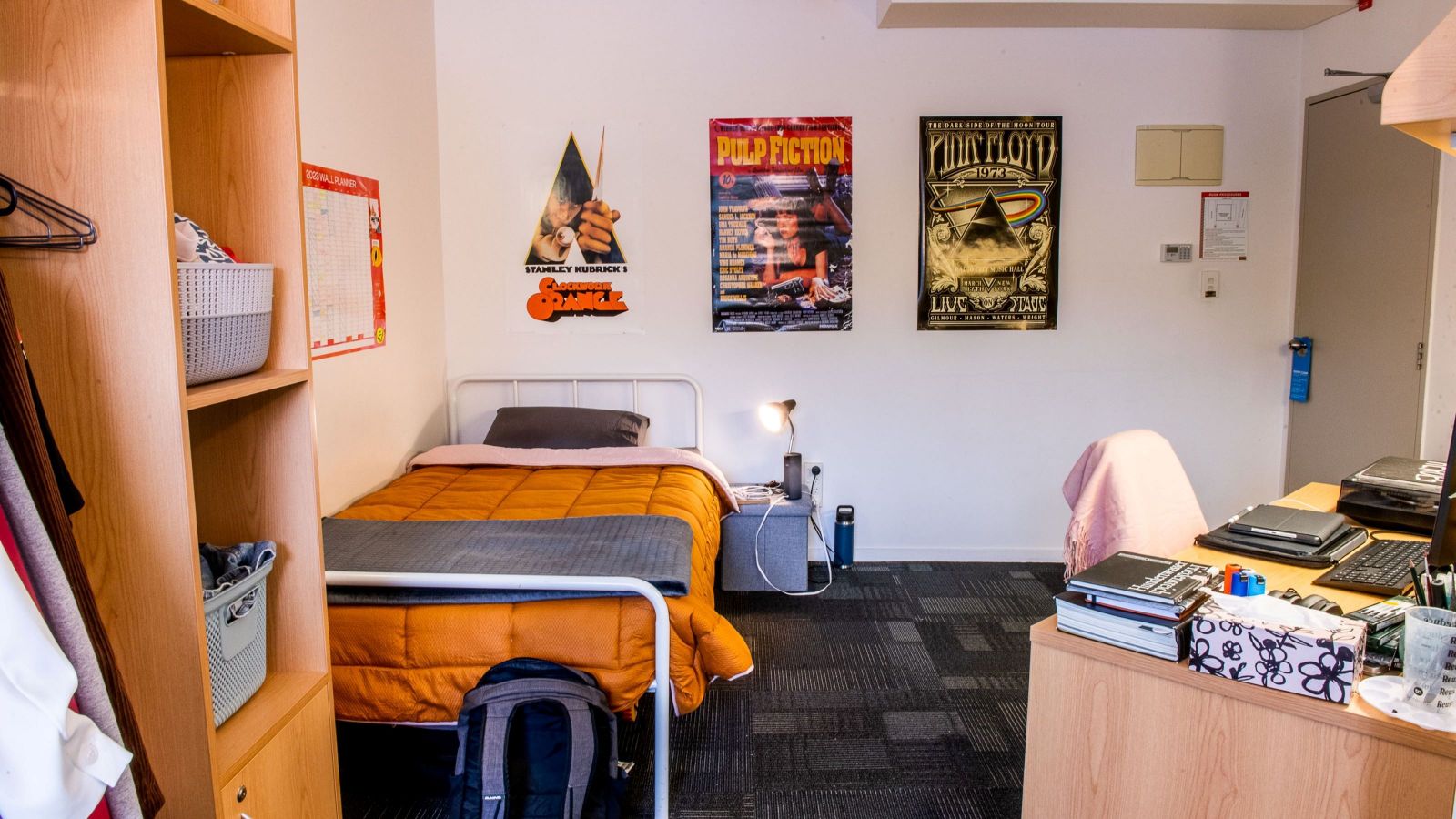 Single room at Cumberland House, with a bed, wardrobe, and desk.