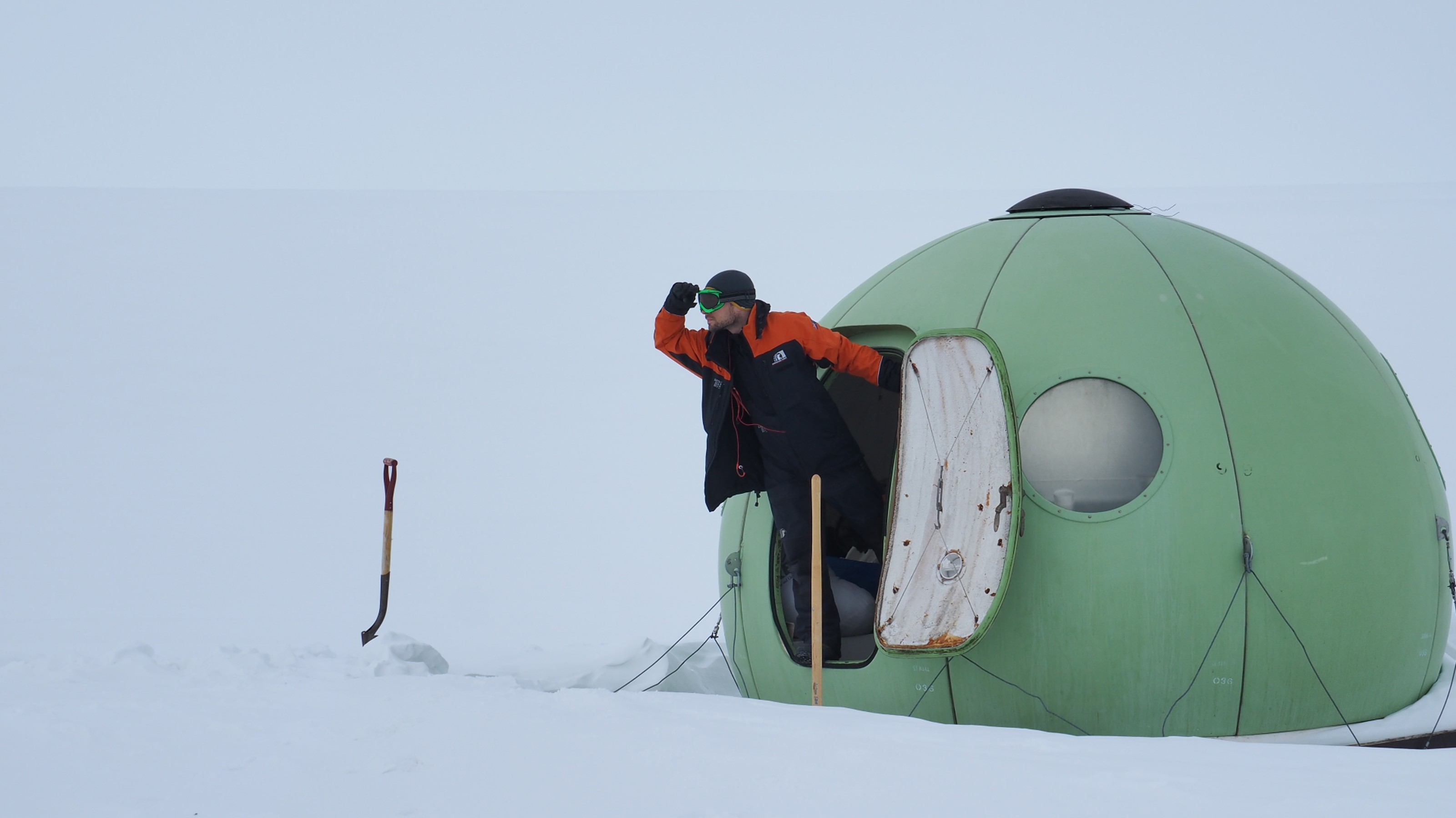 looking out from green igloo tent