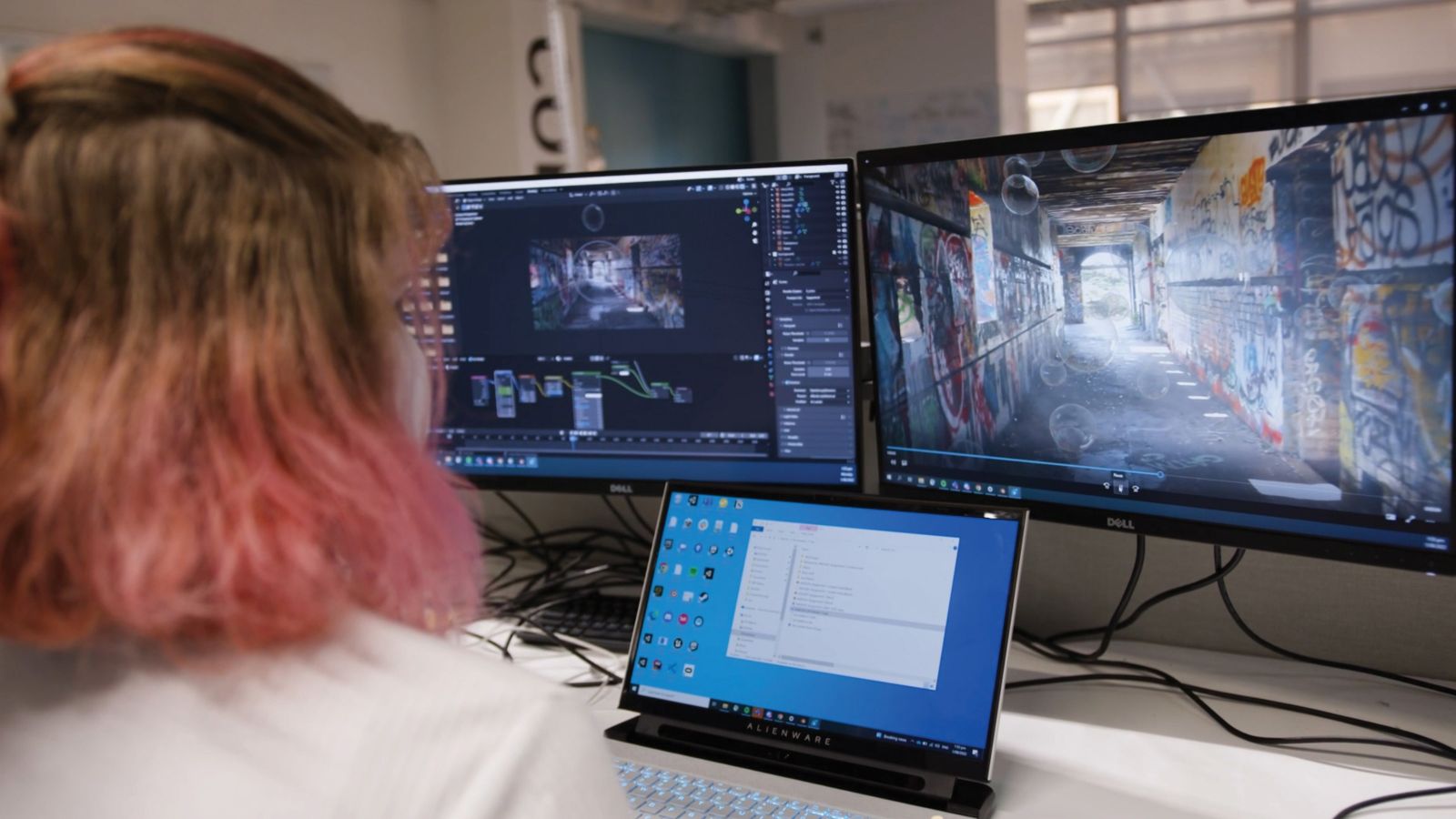 Person looking at computer screens