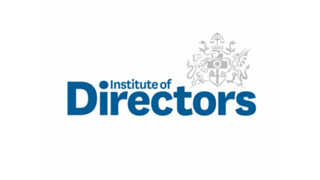 A logo for Institute of directors with blue writing and a grey coat of arms