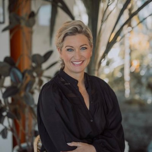 Blonde woman with short hair smiling 