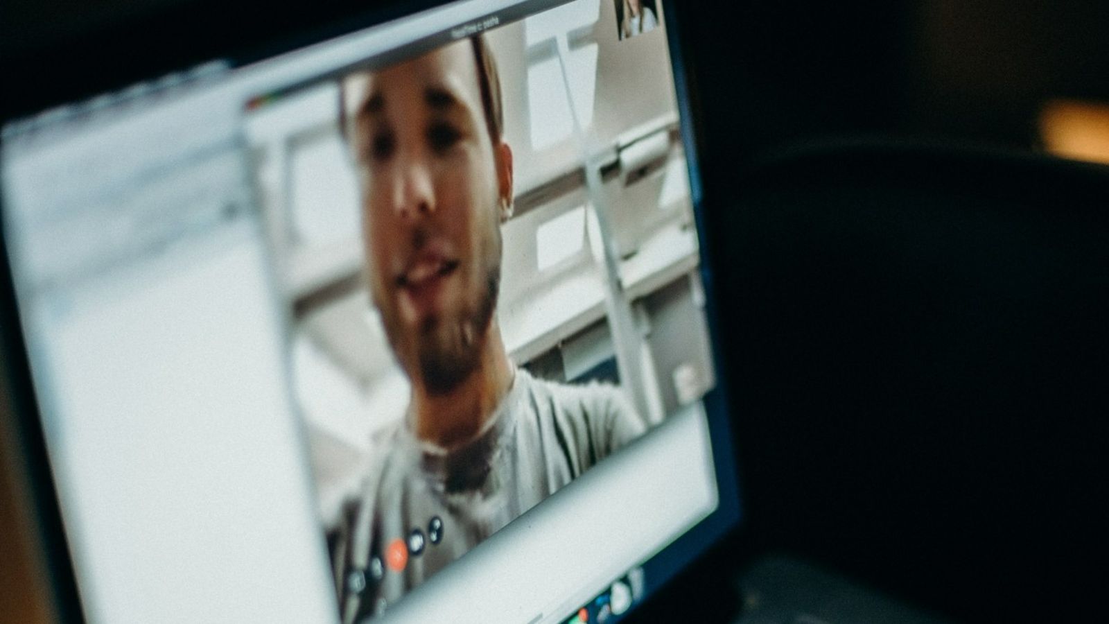 Screen of device showing person