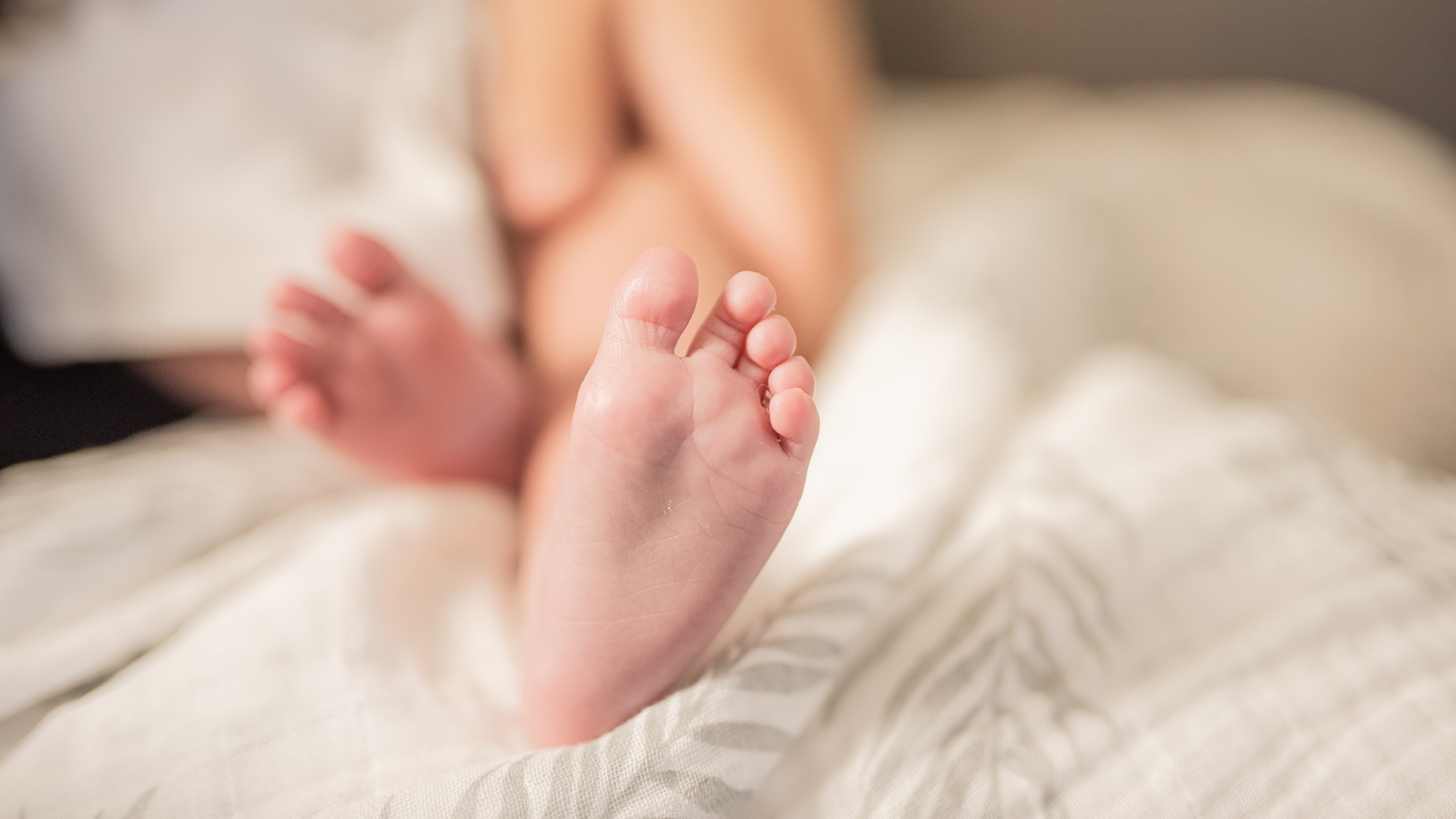 Close up of baby's foot with blurry background
