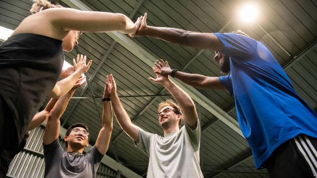 Students high fiving
