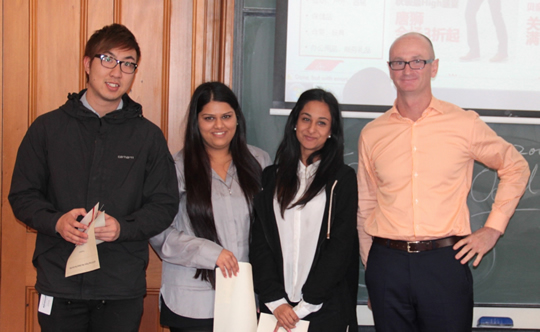 First Prize (left to right): Hoe Kit (Andrew) Chin, Jigna Patel, Atisha Patel, (with Paul Reid) &ndash; &ldquo;Digitized Postal Kiosks&rdquo;