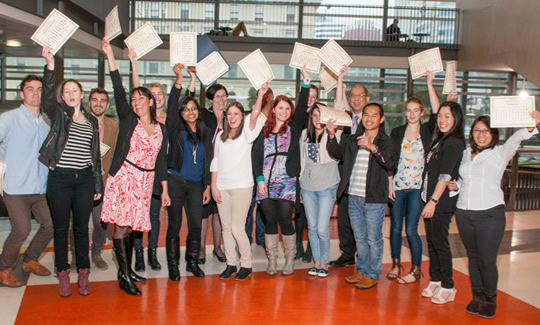 IBUS404 Cross-cultural Management students celebrating their performance in X-culture exercise