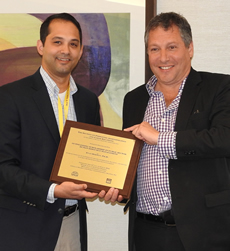 Professor Evan Berman accepts award from ASPA section chair Jared Llorens 